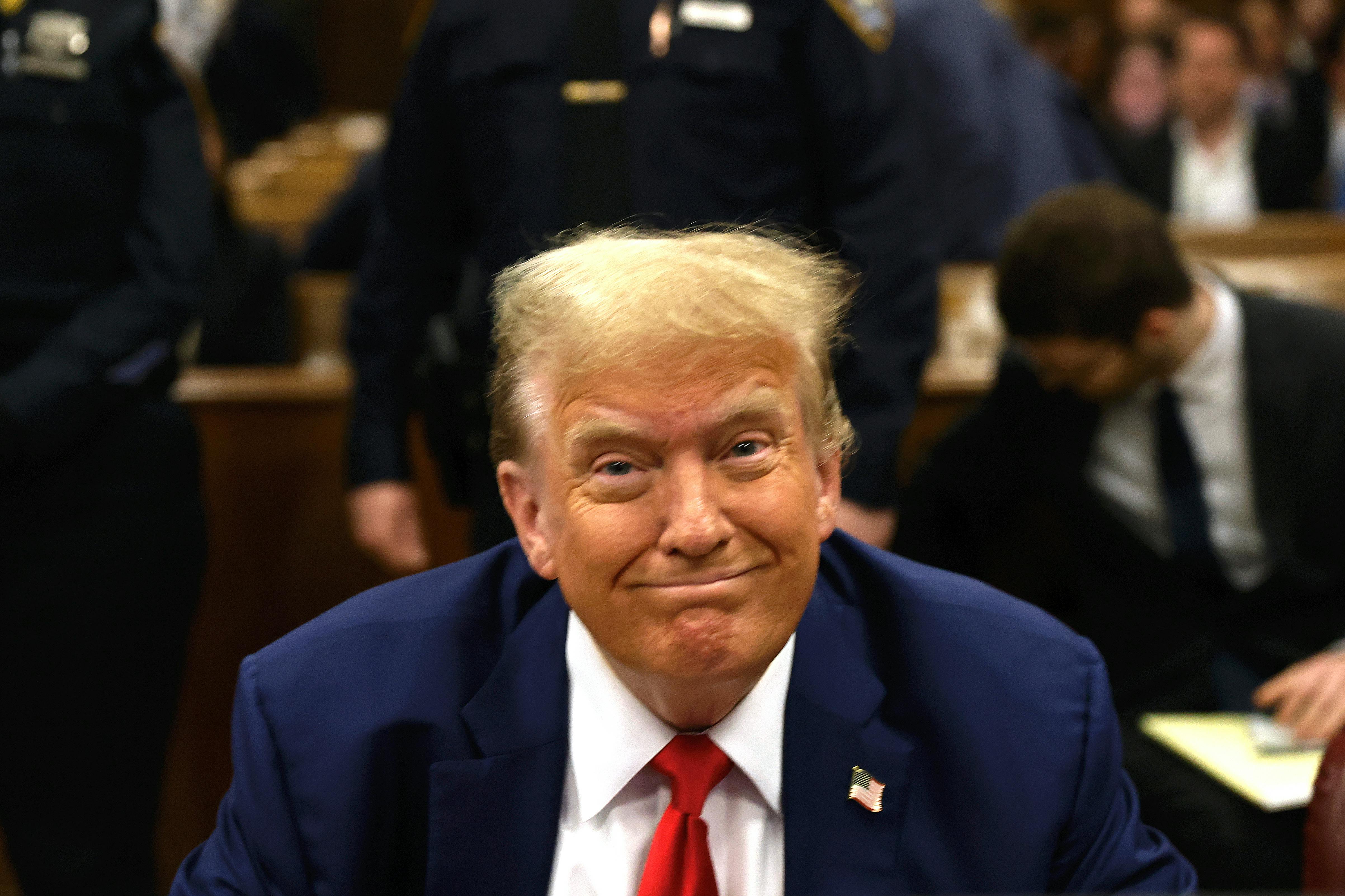 Trump smiles at his hush-money trial 