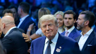 Donald Trump smiles at the White House UFC fight