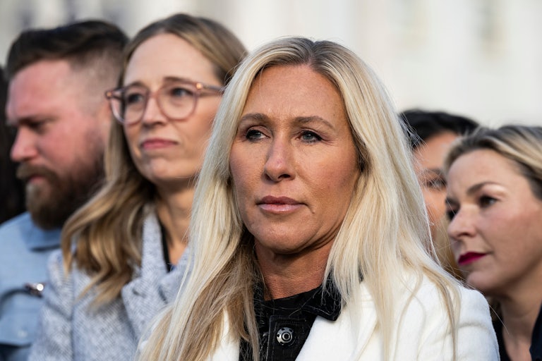 Representative Marjorie Taylor Greene at a press conference with Jeffrey Epstein survivors.