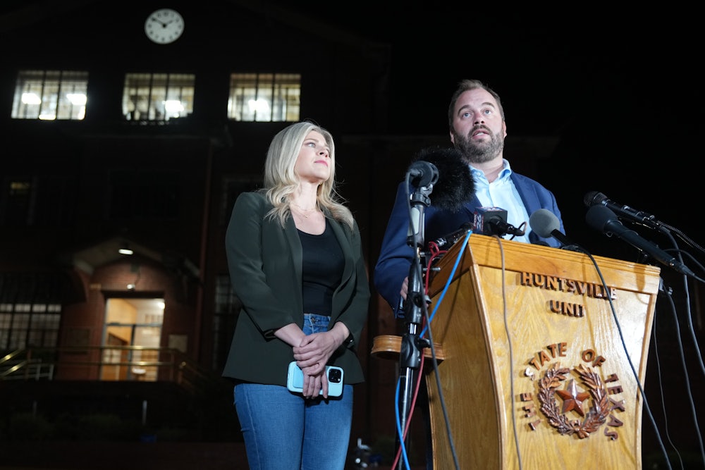 Texas State Rep. John Bucy III speaks alongside fellow Rep. Lacey Hull after the Texas Supreme Court issued a late stay of execution against Robert Roberson at the Texas State Penitentiary. Roberson was convicted in the 2002 killing of his 2-year-old daughter based on claims of "shaken baby syndrome."