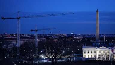 Construction cranes next to the White House