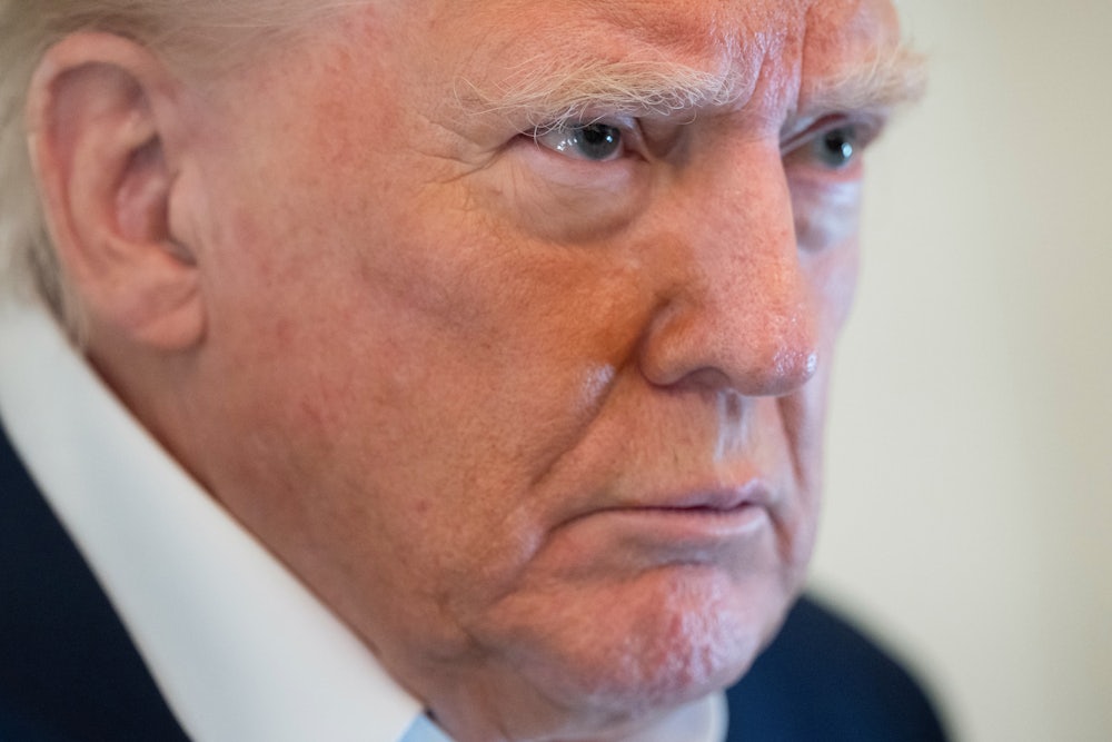 close up of Donald Trump looking constipated