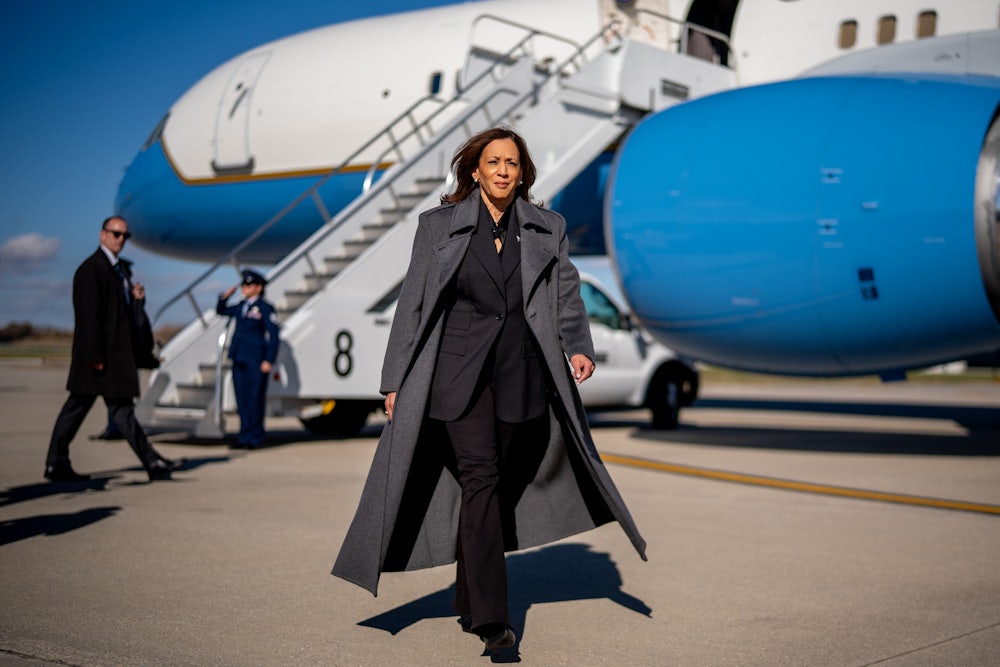 Kamala Harris confidently strides in front of Air Force Two.