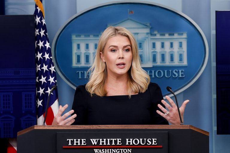 Press Secretary Karoline Leavitt gestures while speaking to reporters at the White House
