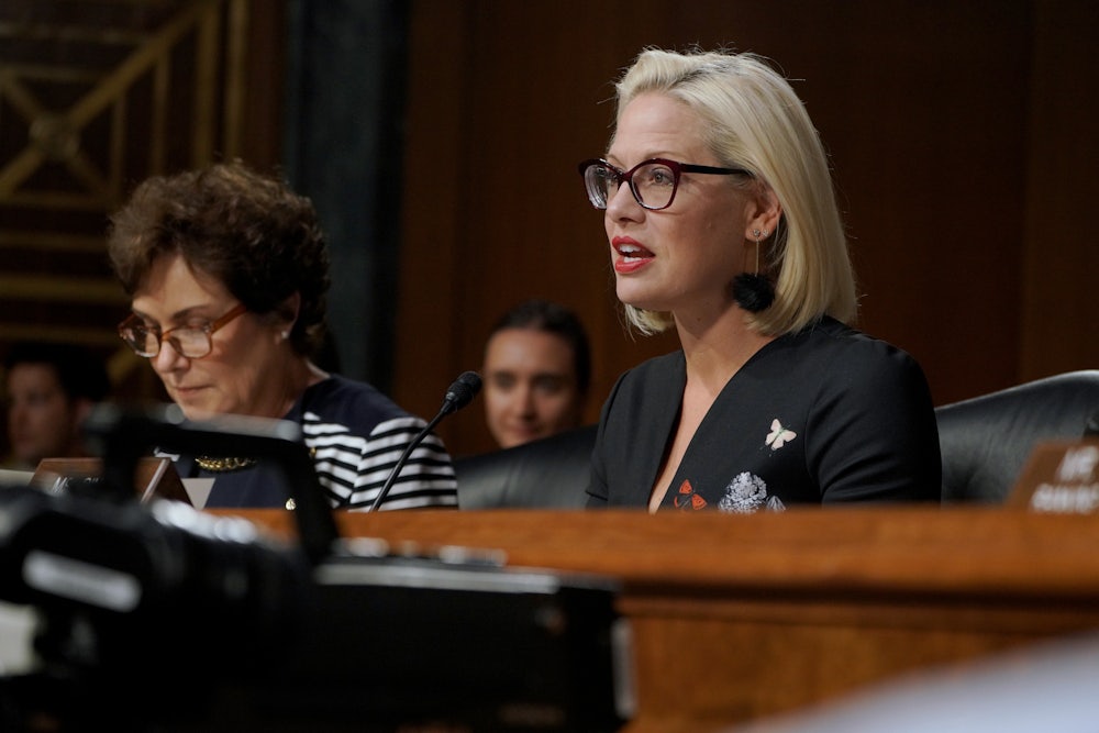 Senator Kyrsten Sinema speaks at the at a hearing on Capitol Hill.