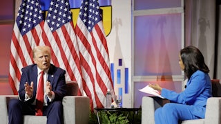 Donald Trump is interviewed by Rachel Scott at the National Association of Black Journalists