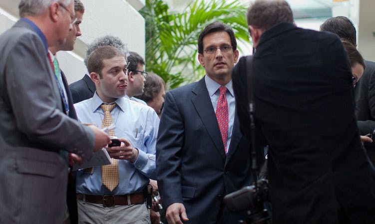 House Majority Eric Cantor is brazenly photobombed. (Jay Westcott)