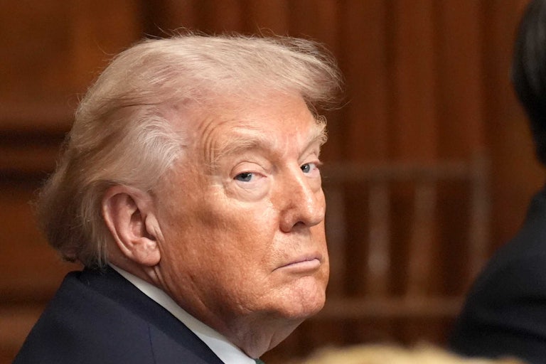 Donald Trump looks over his shoulder