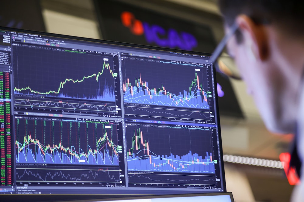 Natural gas futures charts on the floor of the American Stock Exchange at the New York Stock Exchange in New York on January 20. Stocks, bonds and the dollar fell after President Donald Trump threatened tariffs on various European countries before high-level meetings in Davos amid a growing standoff over his ambitions to take over Greenland.