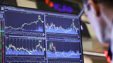Natural gas futures charts on the floor of the American Stock Exchange at the New York Stock Exchange in New York on January 20. Stocks, bonds and the dollar fell after President Donald Trump threatened tariffs on various European countries before high-level meetings in Davos amid a growing standoff over his ambitions to take over Greenland.