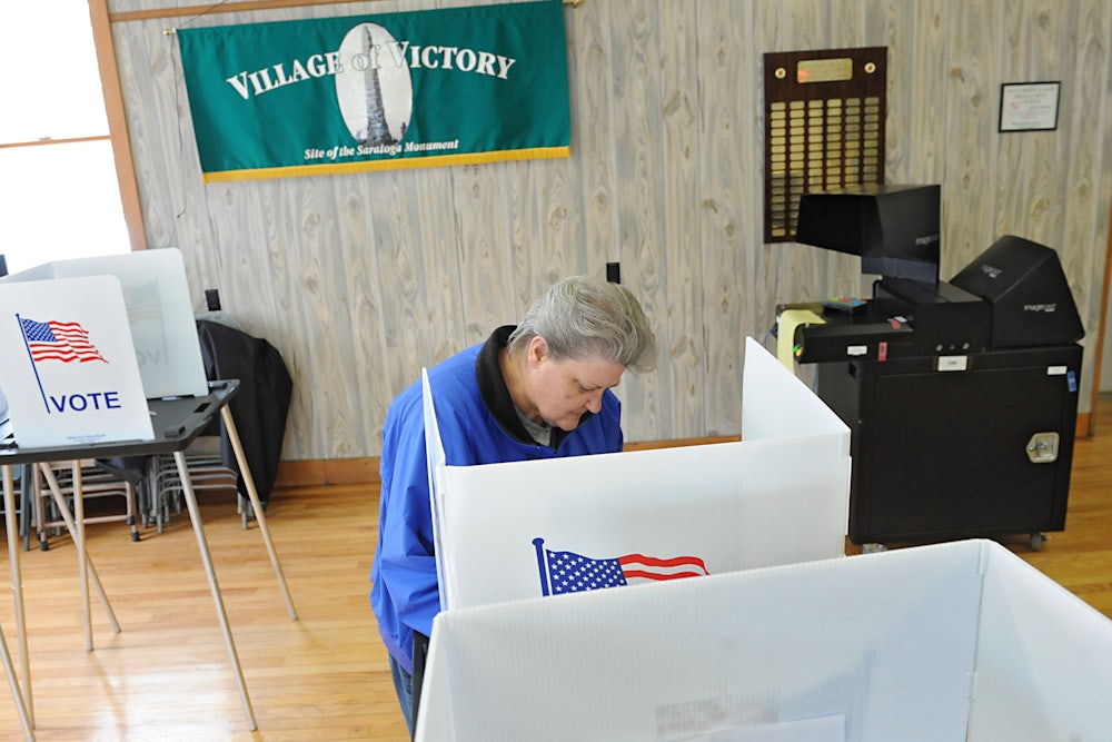 Bonnie Root of Victory votes in a mayoral election at the Victory Community Center on Tuesday, March 19, 2013 in Victory, N.Y.