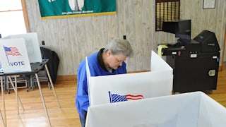 Bonnie Root of Victory votes in a mayoral election at the Victory Community Center on Tuesday, March 19, 2013 in Victory, N.Y.