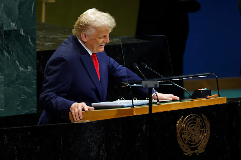 President Donald Trump laughs about a teleprompter issue as he speaks before the U.N. General Assembly.