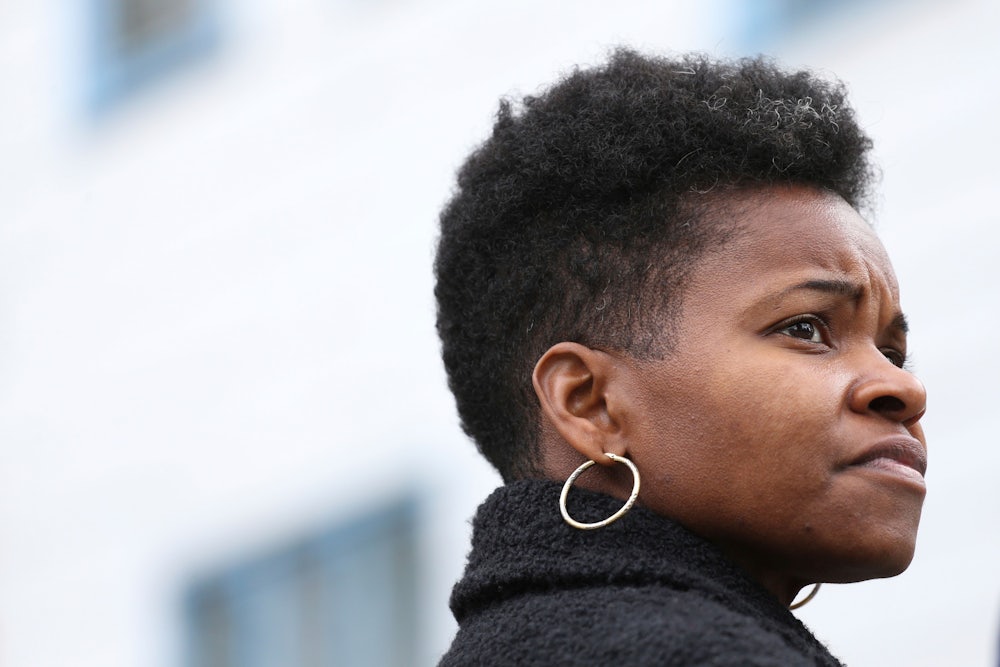 Buffalo mayoral candidate India Walton looks on during a walking tour of local businesses in Buffalo, N.Y.
