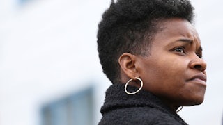 Buffalo mayoral candidate India Walton looks on during a walking tour of local businesses in Buffalo, N.Y.