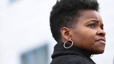 Buffalo mayoral candidate India Walton looks on during a walking tour of local businesses in Buffalo, N.Y.