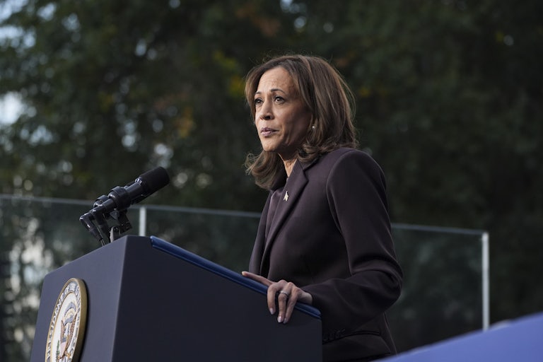 Kamala Harris stands at a podium