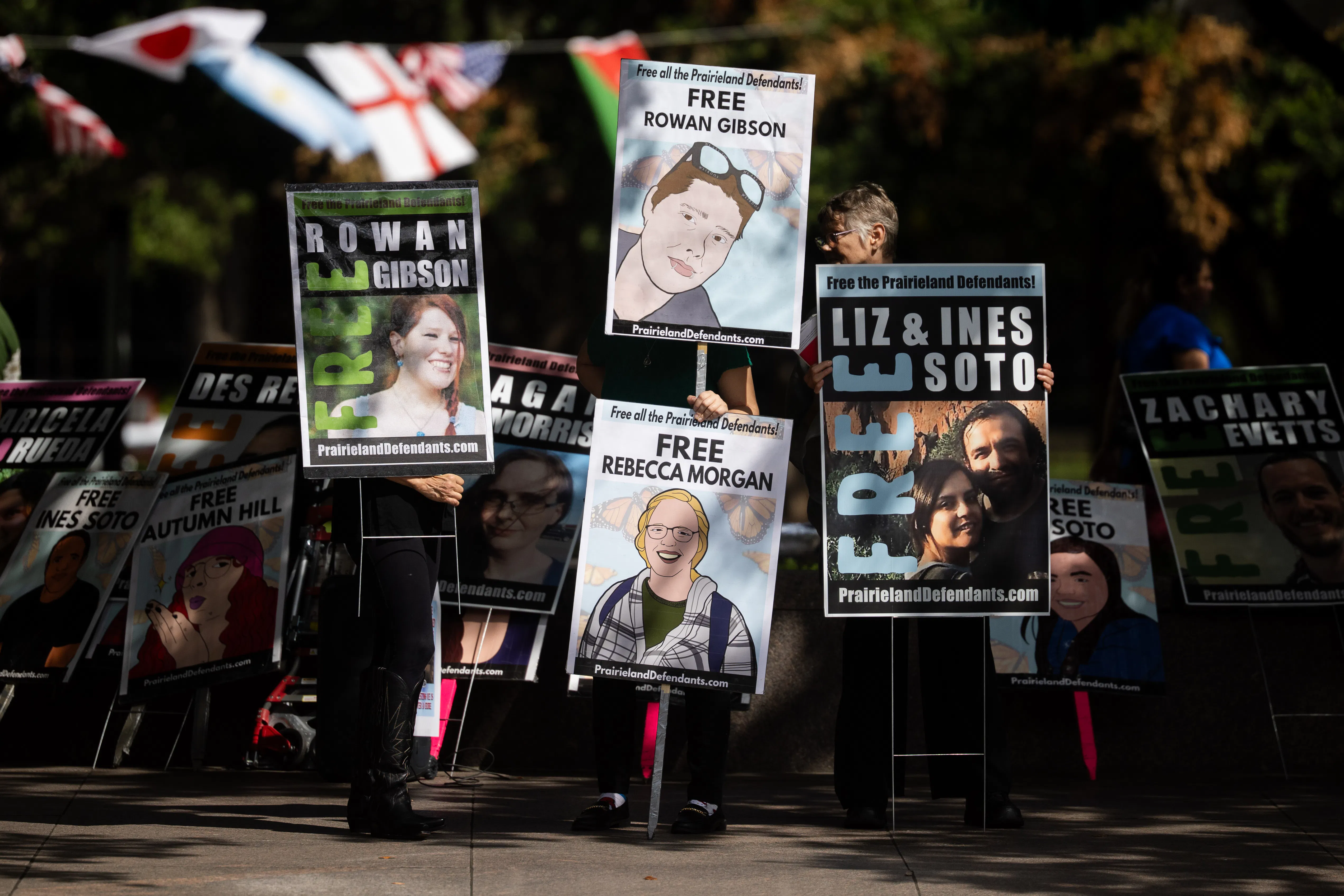 On July 1, outside of the Eldon B. Mahon U.S. Courthouse in Fort Worth, Texas, protestors held up signs with the faces of the Prairieland defendants.