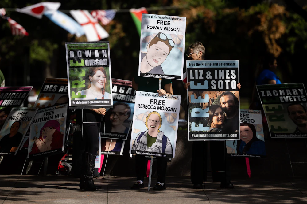 On July 1, outside of the Eldon B. Mahon U.S. Courthouse in Fort Worth, Texas, protestors held up signs with the faces of the Prairieland defendants.