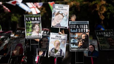 On July 1, outside of the Eldon B. Mahon U.S. Courthouse in Fort Worth, Texas, protestors held up signs with the faces of the Prairieland defendants.