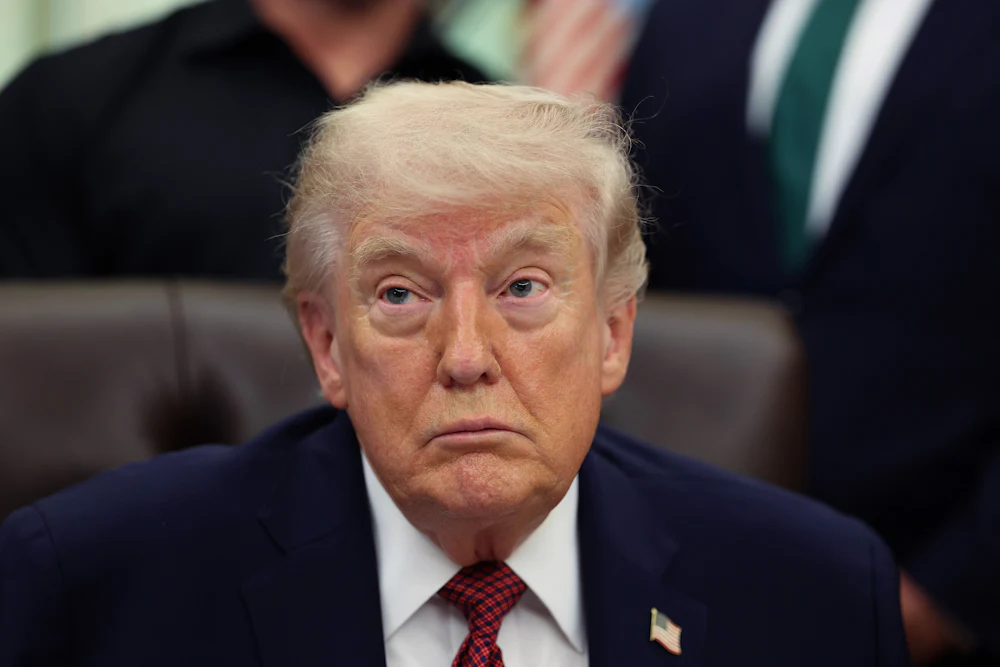 Donald Trump stares listlessly