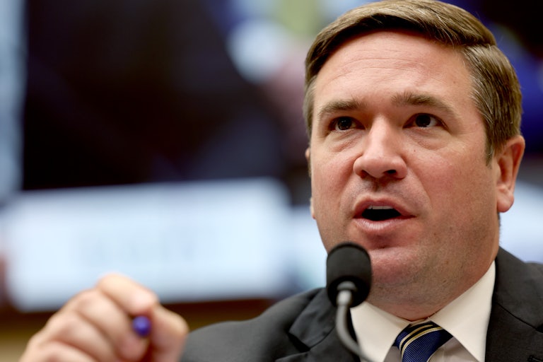 Andrew Bailey speaks into a microphone