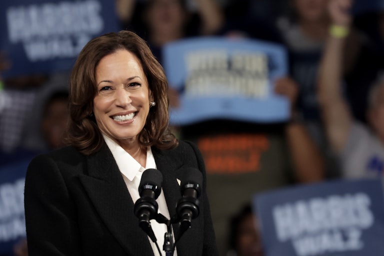 Kamala Harris flashes a big smile at a political rally