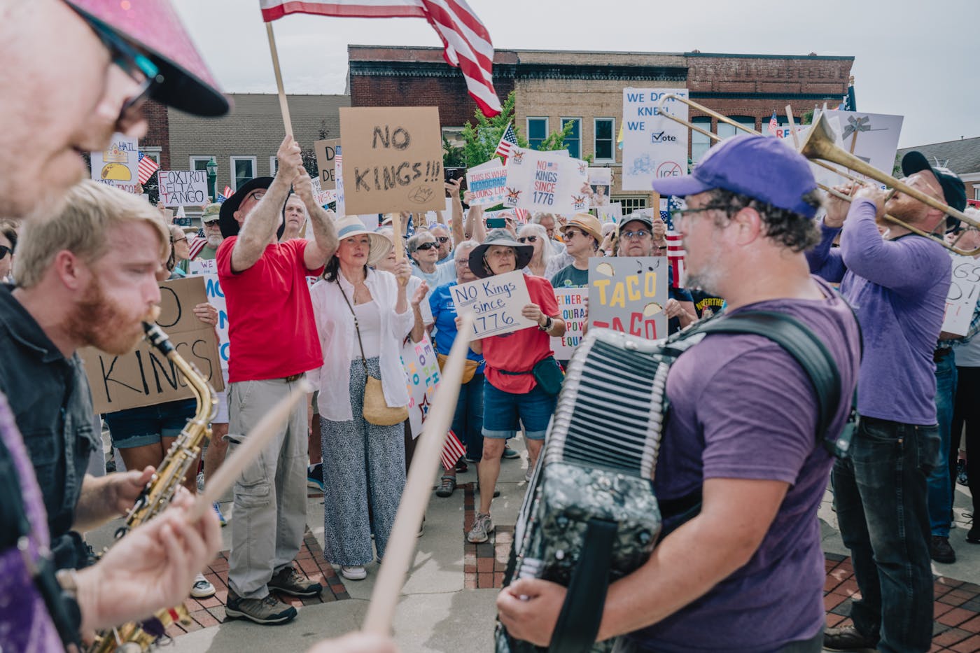 No Kings protesters are joined in song by a group of local musicians in Hendersonville.