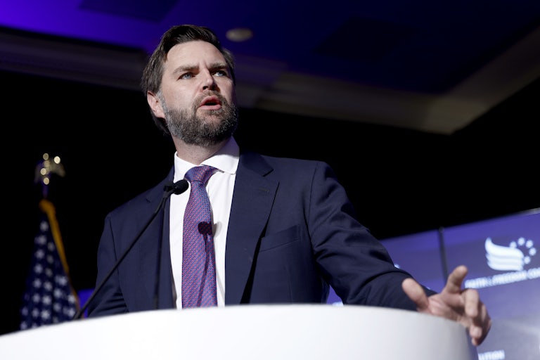 J.D. Vance speaks at a lectern.
