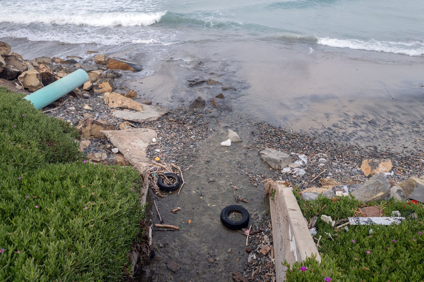 A photograph of sewage spilling onto Playa Blanca, a beach in Tijuana, in March of this year.