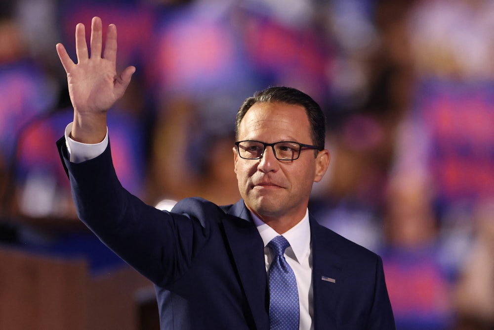 Pennsylvania Governor Josh Shapiro waves