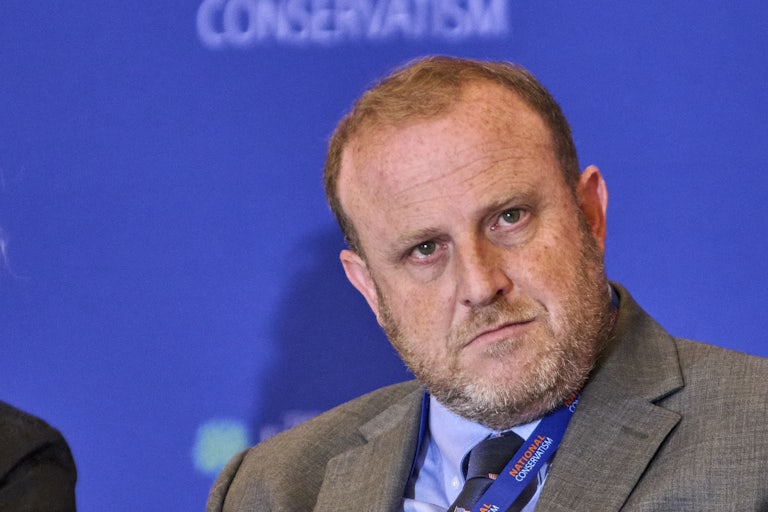 Jeremy Carl stares directly at the screen