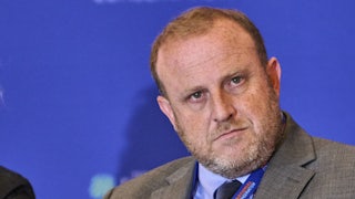 Jeremy Carl stares directly at the screen