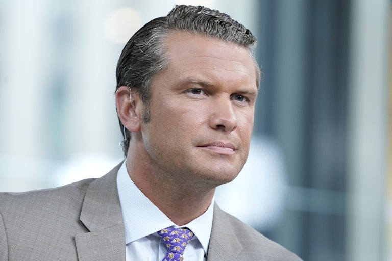 Pete Hegseth looks straight ahead
