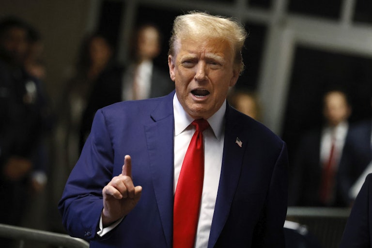 Donald Trump gestures as he speaks