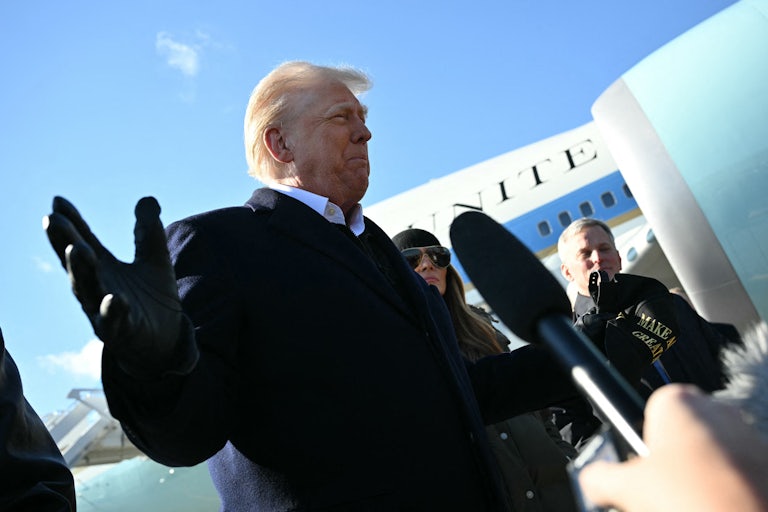 Donald Trump speaks to the press upon arrival at Asheville Regional Airport in Fletcher, North Carolina.