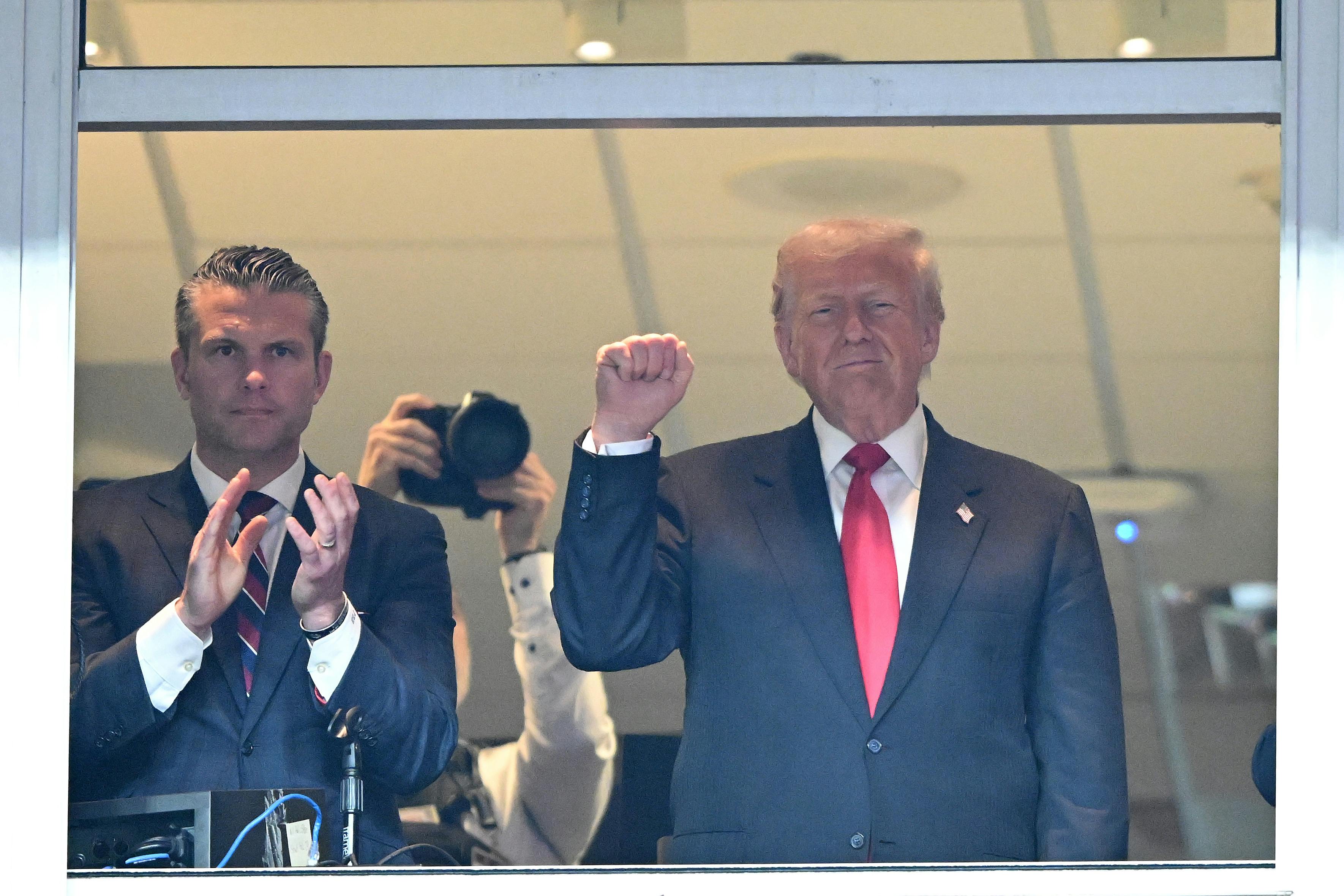 Trump in a box at a recent Washington Commanders football game 