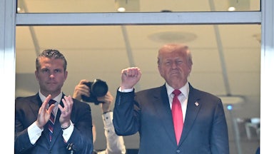 Trump in a box at a recent Washington Commanders football game