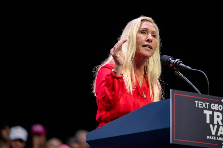 Representative Marjorie Taylor Greene speaks a a lectern