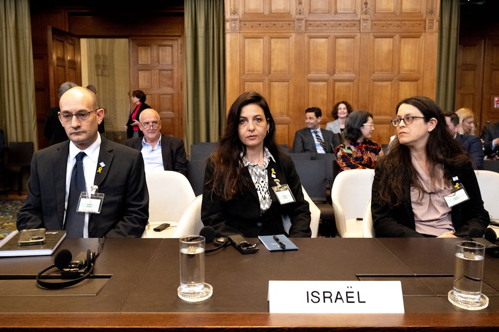 On May 16, at the International Court of Justice in The Hague, lawyers for Israel waited to hear arguments from South Africa's legal team. From left: Gilad Noam, Israel's deputy attorney general for international law; Isrel Tamar Kaplan Tourgman, principal deputy legal adviser of the Ministry of Foreign Affairs; and Avgail Frisch Ben Avraham, legal adviser at the Israeli Embassy to the Netherlands.