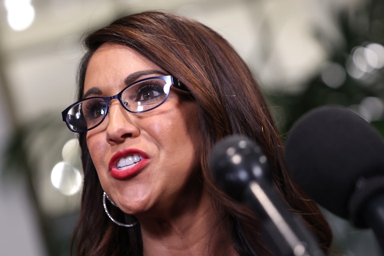 Representative Lauren Boebert speaks at a mic