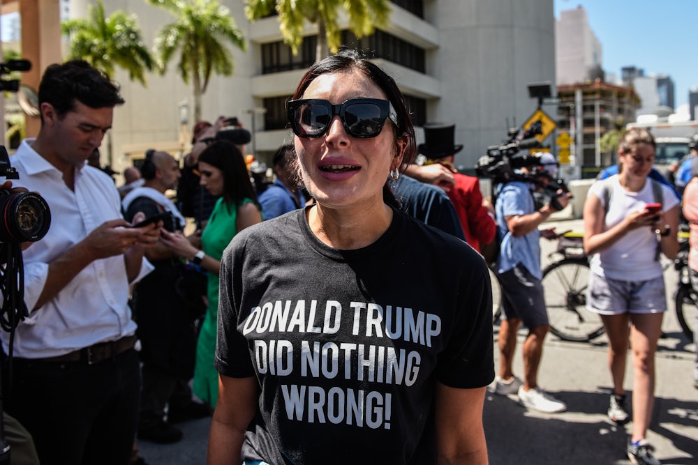 Laura Loomer looms outside the Wilkie D. Ferguson Jr. United States Federal Courthouse in Miami, Florida.
