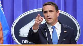 Acting U.S. Attorney General Todd Blanche speaks in a press conference.