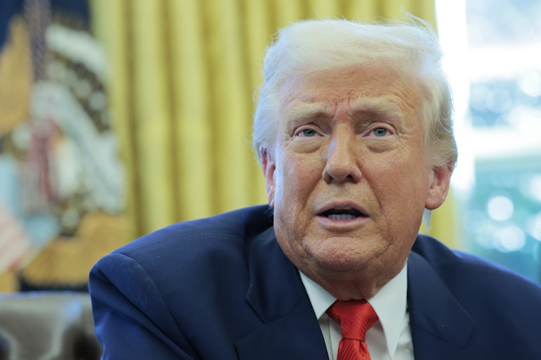 Donald Trump speaks to reporters in the Oval Office