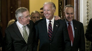 Senators Harry Reid and Chuck Schumer leave the Senate chamber with a beaming Vice President Biden in 2012