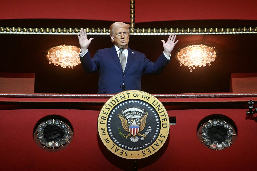 Trump stands at the John F. Kennedy Center for the Performing Arts