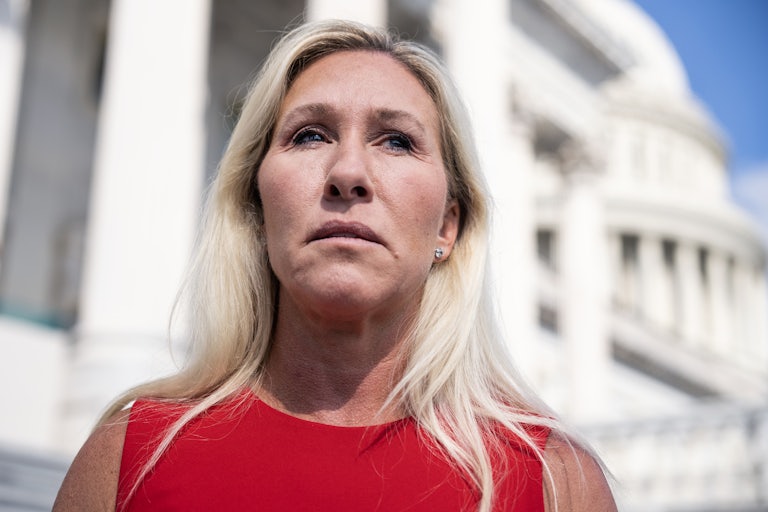 Marjorie Taylor Greene stands outside the U.S. Capitol