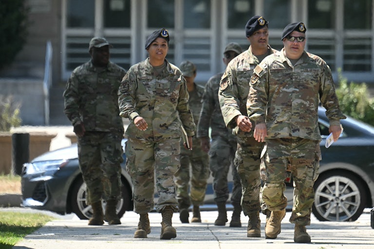 National Guard troops march through the streets of Washington D.C.