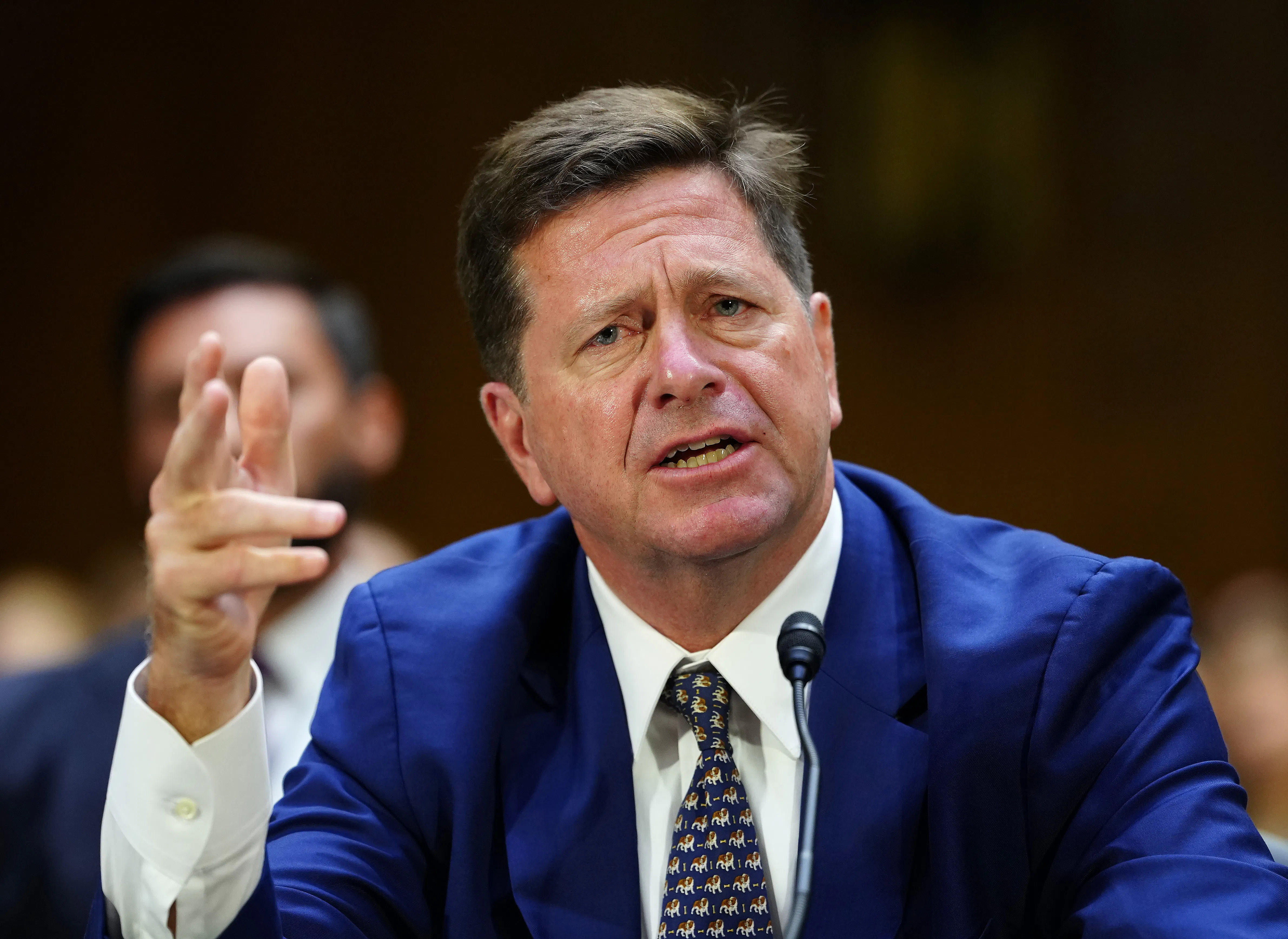 DNI nominee Jay Clayton gestures while speaking during his Senate committee confirmation hearing
