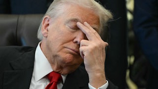 Donald Trump looks tired as he puts fingers to forehead